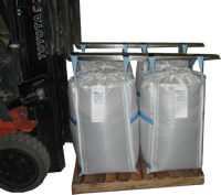 four drum bags being lifted by the loops as alternative to fiber drums